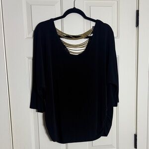 Elegant Black Top with Gold Accents